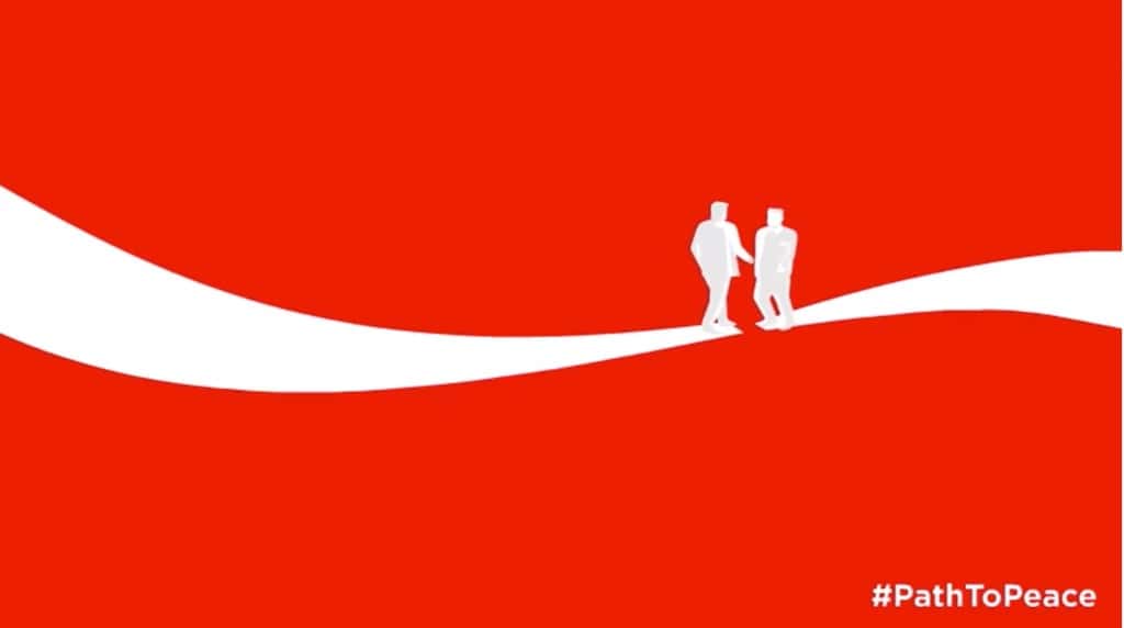 싱가포르에서 트럼프와 김정은이 만남을 에니메이션화한  코카콜라 coke